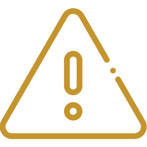 A gold outlined warning triangle with an exclamation mark inside, indicating caution or alert.